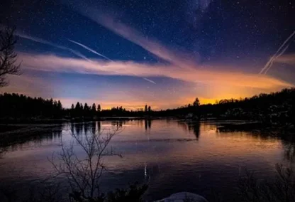 Gorgeous view of the lake during night with the stars filling the sky
